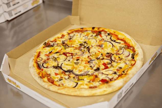 Как лучше приготовить вкусную пиццу для большой компании